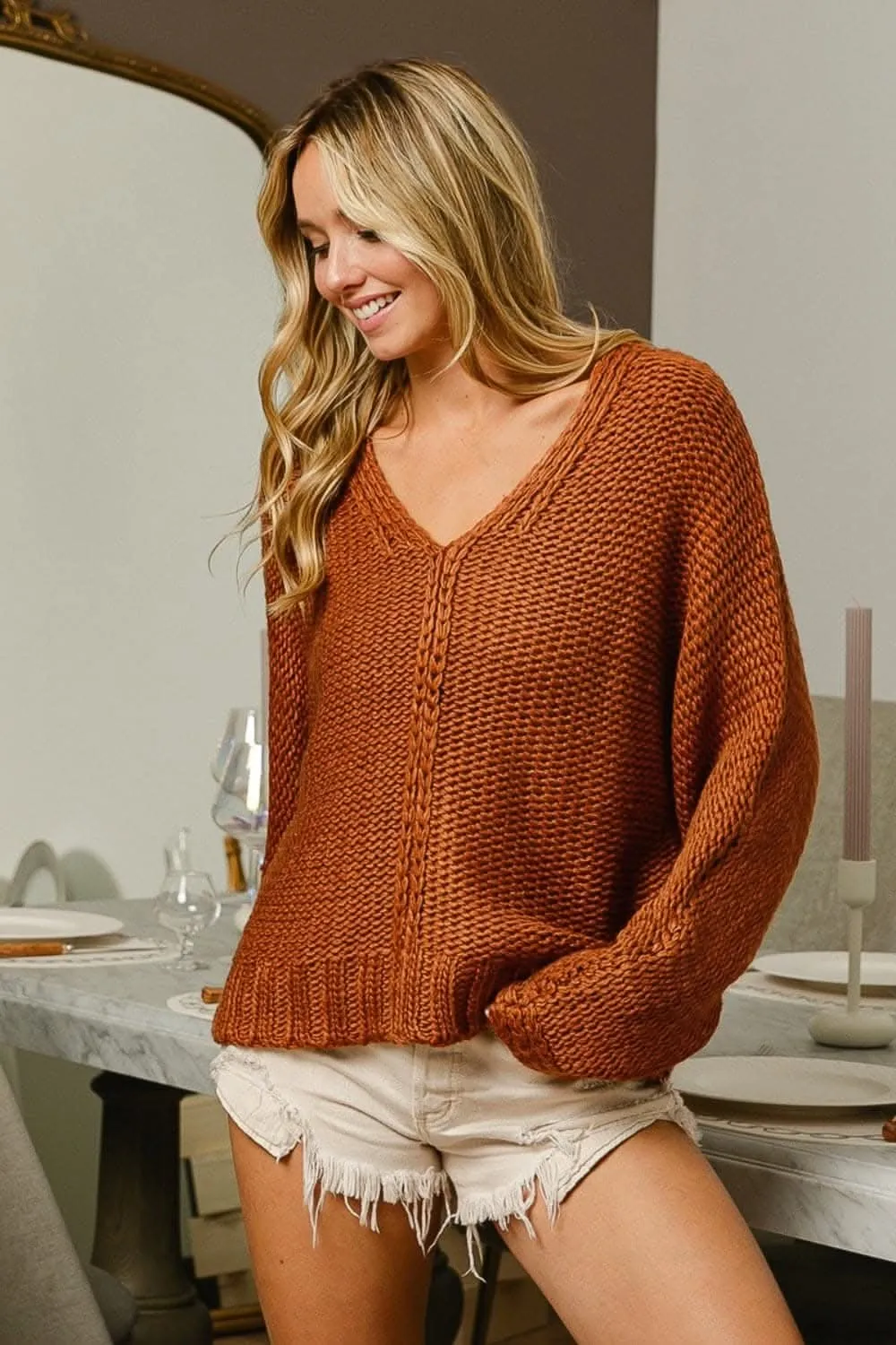 Chic v-neck cable knit sweater for winter elegance